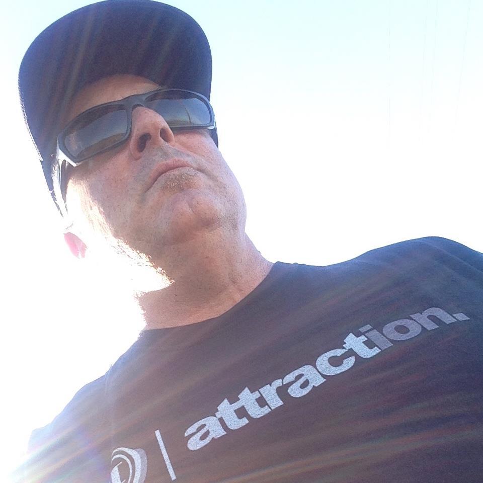 A man wearing sunglasses and a hat.