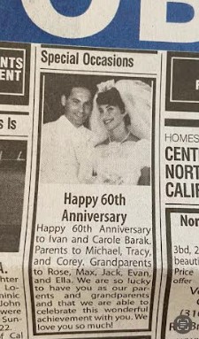 A newspaper clipping of an anniversary with two people.